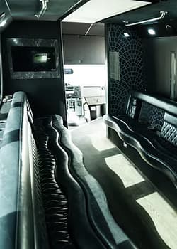 Interior of party bus with plush seating